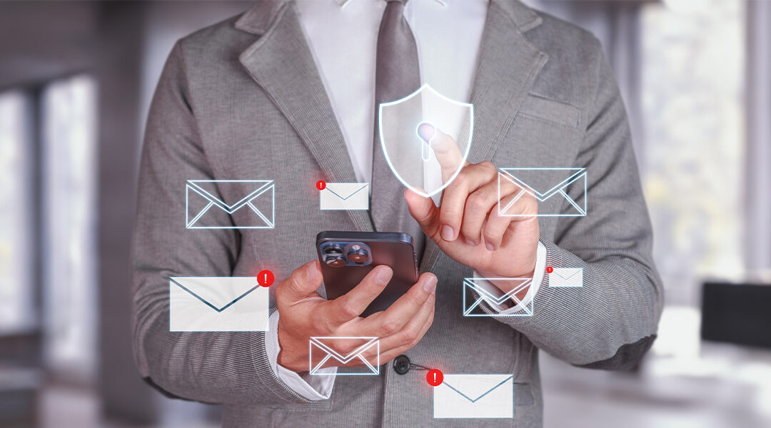 Businessman using smartphone with email notifications